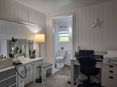 This Home Is Immaculate in Everyway ! Situated Right On the Lake on Riverwood Golf Club in Florida - for sale on GolfHomes.com, golf home, golf lot