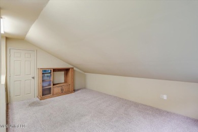 Discover this spacious 4-Bedroom, 2.5-bath home with at least on Castlewoods Golf Club in Mississippi - for sale on GolfHomes.com, golf home, golf lot