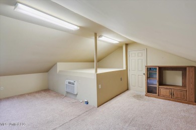 Discover this spacious 4-Bedroom, 2.5-bath home with at least on Castlewoods Golf Club in Mississippi - for sale on GolfHomes.com, golf home, golf lot