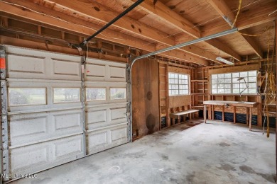 Discover this spacious 4-Bedroom, 2.5-bath home with at least on Castlewoods Golf Club in Mississippi - for sale on GolfHomes.com, golf home, golf lot