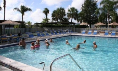 This Home Is Immaculate in Everyway ! Situated Right On the Lake on Riverwood Golf Club in Florida - for sale on GolfHomes.com, golf home, golf lot