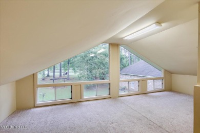 Discover this spacious 4-Bedroom, 2.5-bath home with at least on Castlewoods Golf Club in Mississippi - for sale on GolfHomes.com, golf home, golf lot