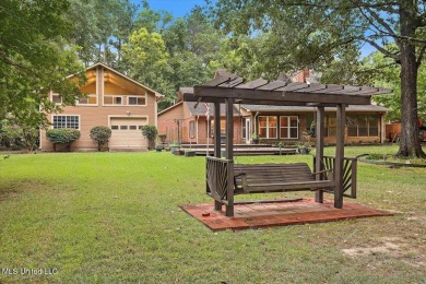 Discover this spacious 4-Bedroom, 2.5-bath home with at least on Castlewoods Golf Club in Mississippi - for sale on GolfHomes.com, golf home, golf lot