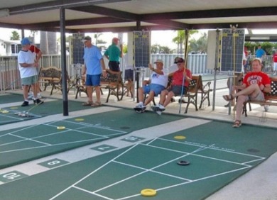 This Home Is Immaculate in Everyway ! Situated Right On the Lake on Riverwood Golf Club in Florida - for sale on GolfHomes.com, golf home, golf lot