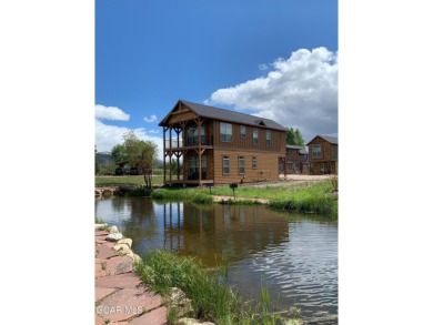 Discover the charm of mountain living with this two-bedroom, 2 on Grand Elk Ranch and Club in Colorado - for sale on GolfHomes.com, golf home, golf lot