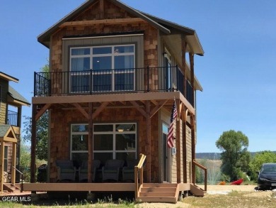 Discover the charm of mountain living with this two-bedroom, 2 on Grand Elk Ranch and Club in Colorado - for sale on GolfHomes.com, golf home, golf lot