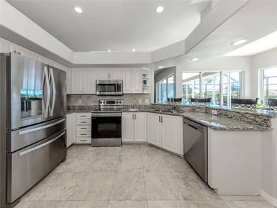 Discover the unmatched lifestyle of a spacious, custom-built on The Venice Golf and Country Club in Florida - for sale on GolfHomes.com, golf home, golf lot