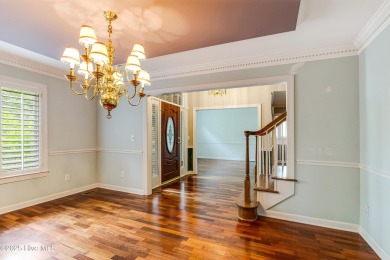 Welcome to this stately brick home overlooking the 11th hole of on Sea Trail Golf Resort in North Carolina - for sale on GolfHomes.com, golf home, golf lot