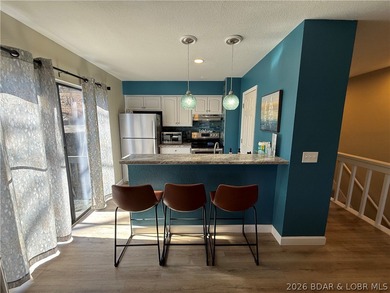 Welcome to your fully furnished lake retreat home featuring 4 on The Oaks Golf Course in Missouri - for sale on GolfHomes.com, golf home, golf lot