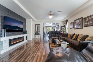Paid-off solar panels and a prime corner lot with an expansive on Rhodes Ranch Golf Club in Nevada - for sale on GolfHomes.com, golf home, golf lot