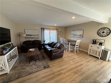 Welcome to your fully furnished lake retreat home featuring 4 on The Oaks Golf Course in Missouri - for sale on GolfHomes.com, golf home, golf lot