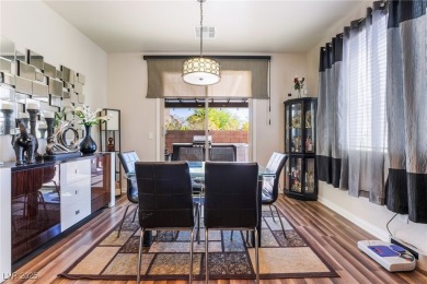 Paid-off solar panels and a prime corner lot with an expansive on Rhodes Ranch Golf Club in Nevada - for sale on GolfHomes.com, golf home, golf lot
