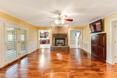 Welcome to this stately brick home overlooking the 11th hole of on Sea Trail Golf Resort in North Carolina - for sale on GolfHomes.com, golf home, golf lot