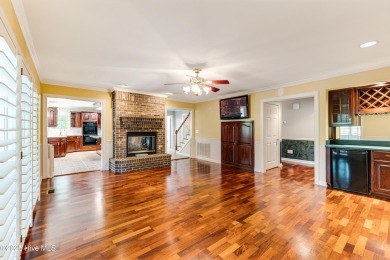 Welcome to this stately brick home overlooking the 11th hole of on Sea Trail Golf Resort in North Carolina - for sale on GolfHomes.com, golf home, golf lot