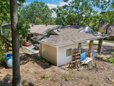 Are you in search of the perfect summer home or a welcoming on Indian Hills Country Club in Arkansas - for sale on GolfHomes.com, golf home, golf lot