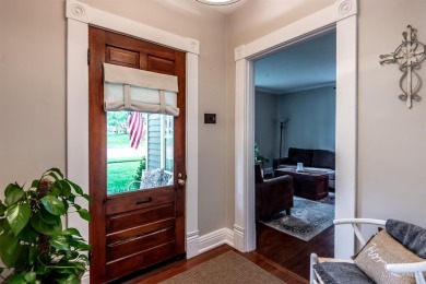 Step into timeless charm with this stunning Folk Victorian home on Harmon Golf Club in Ohio - for sale on GolfHomes.com, golf home, golf lot