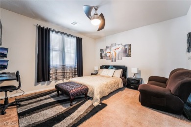 Paid-off solar panels and a prime corner lot with an expansive on Rhodes Ranch Golf Club in Nevada - for sale on GolfHomes.com, golf home, golf lot