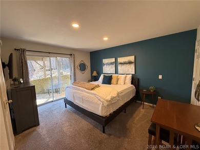 Welcome to your fully furnished lake retreat home featuring 4 on The Oaks Golf Course in Missouri - for sale on GolfHomes.com, golf home, golf lot