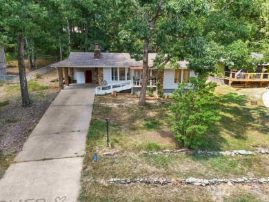 Are you in search of the perfect summer home or a welcoming on Indian Hills Country Club in Arkansas - for sale on GolfHomes.com, golf home, golf lot