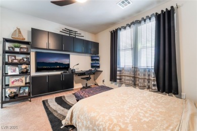 Paid-off solar panels and a prime corner lot with an expansive on Rhodes Ranch Golf Club in Nevada - for sale on GolfHomes.com, golf home, golf lot
