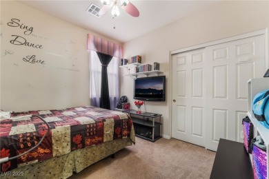 Paid-off solar panels and a prime corner lot with an expansive on Rhodes Ranch Golf Club in Nevada - for sale on GolfHomes.com, golf home, golf lot