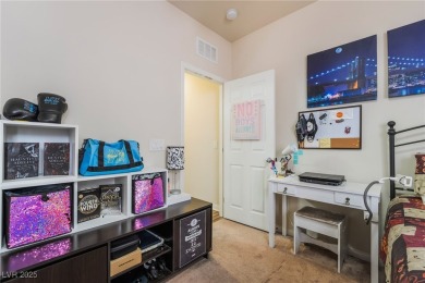 Paid-off solar panels and a prime corner lot with an expansive on Rhodes Ranch Golf Club in Nevada - for sale on GolfHomes.com, golf home, golf lot