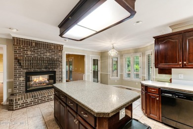 Welcome to this stately brick home overlooking the 11th hole of on Sea Trail Golf Resort in North Carolina - for sale on GolfHomes.com, golf home, golf lot