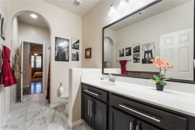 Paid-off solar panels and a prime corner lot with an expansive on Rhodes Ranch Golf Club in Nevada - for sale on GolfHomes.com, golf home, golf lot