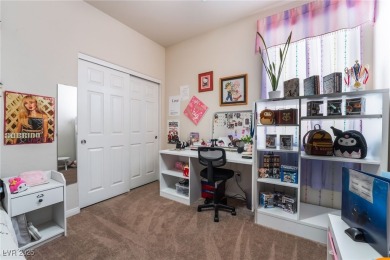 Paid-off solar panels and a prime corner lot with an expansive on Rhodes Ranch Golf Club in Nevada - for sale on GolfHomes.com, golf home, golf lot