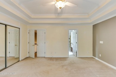 Welcome to this stately brick home overlooking the 11th hole of on Sea Trail Golf Resort in North Carolina - for sale on GolfHomes.com, golf home, golf lot