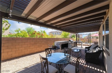 Paid-off solar panels and a prime corner lot with an expansive on Rhodes Ranch Golf Club in Nevada - for sale on GolfHomes.com, golf home, golf lot