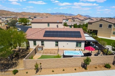 Paid-off solar panels and a prime corner lot with an expansive on Rhodes Ranch Golf Club in Nevada - for sale on GolfHomes.com, golf home, golf lot