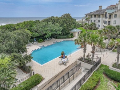 Exceptional corner penthouse in exclusive Spyglass Villas at on Amelia Island Plantation - Long Point in Florida - for sale on GolfHomes.com, golf home, golf lot