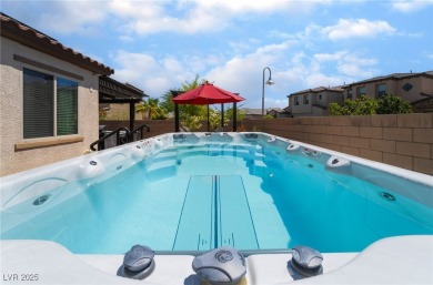 Paid-off solar panels and a prime corner lot with an expansive on Rhodes Ranch Golf Club in Nevada - for sale on GolfHomes.com, golf home, golf lot