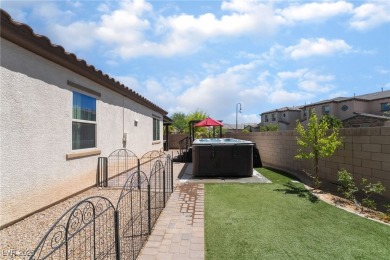 Paid-off solar panels and a prime corner lot with an expansive on Rhodes Ranch Golf Club in Nevada - for sale on GolfHomes.com, golf home, golf lot