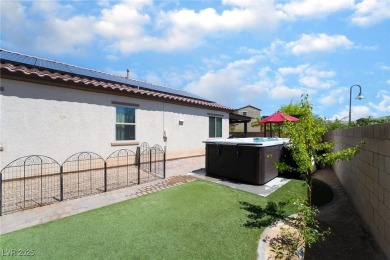 Paid-off solar panels and a prime corner lot with an expansive on Rhodes Ranch Golf Club in Nevada - for sale on GolfHomes.com, golf home, golf lot