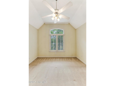 Welcome to this stately brick home overlooking the 11th hole of on Sea Trail Golf Resort in North Carolina - for sale on GolfHomes.com, golf home, golf lot
