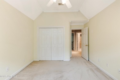 Welcome to this stately brick home overlooking the 11th hole of on Sea Trail Golf Resort in North Carolina - for sale on GolfHomes.com, golf home, golf lot