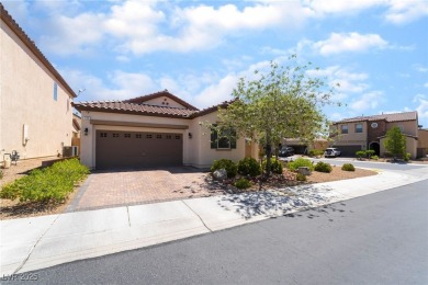 Paid-off solar panels and a prime corner lot with an expansive on Rhodes Ranch Golf Club in Nevada - for sale on GolfHomes.com, golf home, golf lot