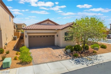 Paid-off solar panels and a prime corner lot with an expansive on Rhodes Ranch Golf Club in Nevada - for sale on GolfHomes.com, golf home, golf lot