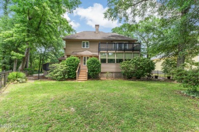 Welcome to this stately brick home overlooking the 11th hole of on Sea Trail Golf Resort in North Carolina - for sale on GolfHomes.com, golf home, golf lot