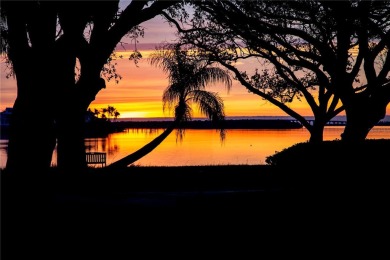 You won't want to miss this first floor 2 bedroom, 2 bath villa on Isla Del Sol Yacht and Country Club in Florida - for sale on GolfHomes.com, golf home, golf lot