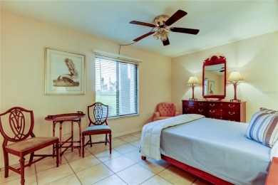 You won't want to miss this first floor 2 bedroom, 2 bath villa on Isla Del Sol Yacht and Country Club in Florida - for sale on GolfHomes.com, golf home, golf lot