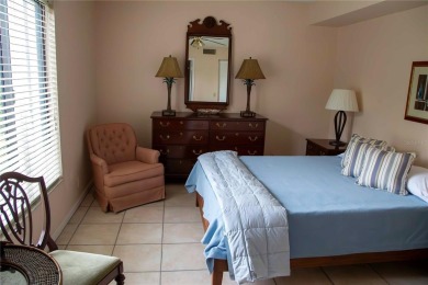 You won't want to miss this first floor 2 bedroom, 2 bath villa on Isla Del Sol Yacht and Country Club in Florida - for sale on GolfHomes.com, golf home, golf lot