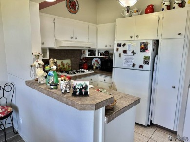 Beautiful remodeled CO-OP on the golf course, 2nd floor unit on Yuma Golf and Country Club in Arizona - for sale on GolfHomes.com, golf home, golf lot