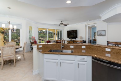 WOW! HERE IS AN AMAZING FIRST FLOOR COACH HOME WITH NUMEROUS on Hammock Bay in Florida - for sale on GolfHomes.com, golf home, golf lot