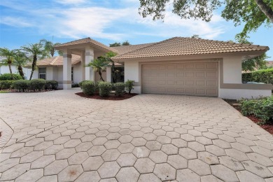 Welcome to this beautifully updated 4-bedroom, 2.5-bathroom pool on TPC Eagle Trace in Florida - for sale on GolfHomes.com, golf home, golf lot