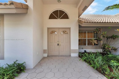 Welcome to this beautifully updated 4-bedroom, 2.5-bathroom pool on TPC Eagle Trace in Florida - for sale on GolfHomes.com, golf home, golf lot