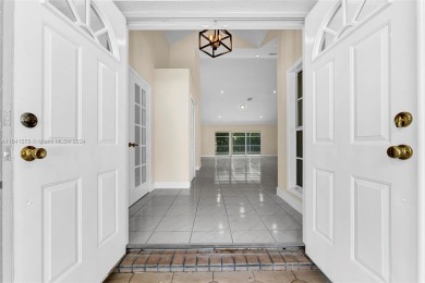 Welcome to this beautifully updated 4-bedroom, 2.5-bathroom pool on TPC Eagle Trace in Florida - for sale on GolfHomes.com, golf home, golf lot