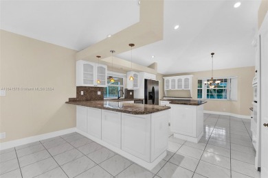 Welcome to this beautifully updated 4-bedroom, 2.5-bathroom pool on TPC Eagle Trace in Florida - for sale on GolfHomes.com, golf home, golf lot